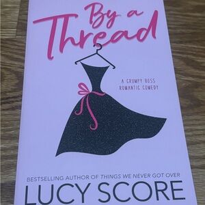 By a Thread Book by Lucy Score